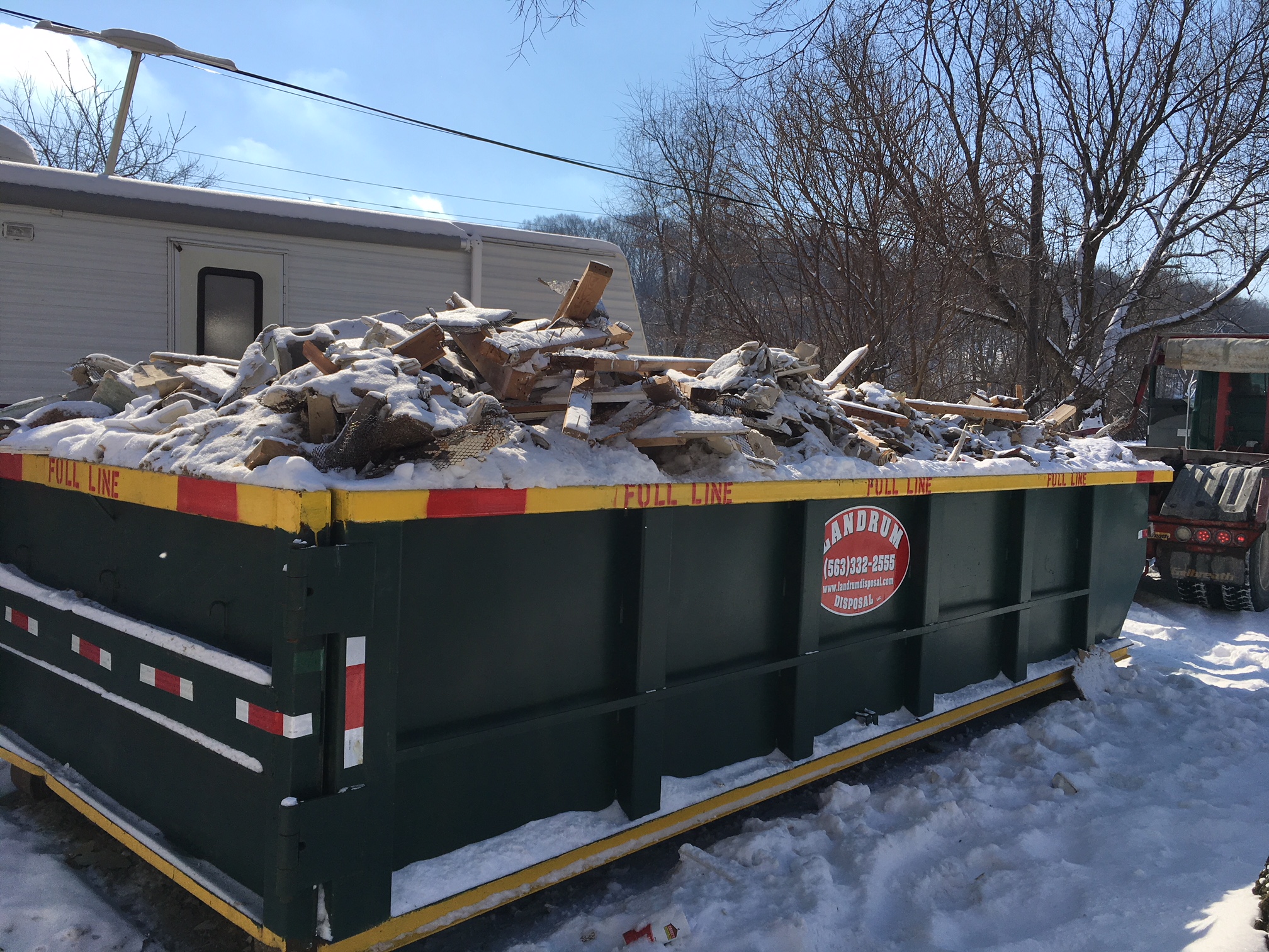 What Are the Hazards of an Overloaded Dumpster?